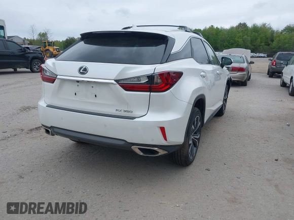 2019 Lexus RX 350 with VIN 2T2BZMCA7KC169897, listed as a IAAI auction lot 42312981 with 35,864 mi miles and . Bid and sale history available at DreamBid. Image 4.