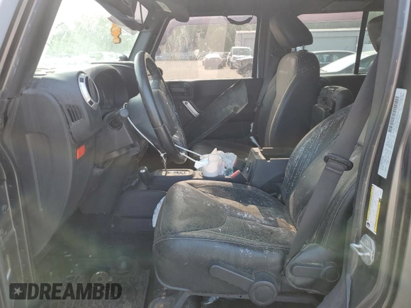 2016 Jeep Wrangler Unlimited Rubicon с VIN 1C4BJWFG1GL183933, выставлен на аукционе Copart как лот 58502105 с пробегом 110 764 миль миль и Списание • Salvage title. История ставок и продаж доступна на DreamBid. Изображение 7.