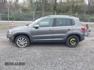 2013 Volkswagen Tiguan SE with VIN WVGAV7AX9DW547633, listed as a IAAI auction lot 42009704 with 51,826 mi miles and . Bid and sale history available at DreamBid. Image 14.