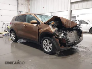 2018 Kia Sportage LX with VIN KNDPMCAC9J7403108, listed as a IAAI auction lot 41946497 with 123,023 mi miles. Bid and sale history available at carsss.com. Image 1.