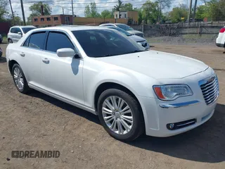 2014 Chrysler 300 z VIN 2C3CCARG0EH298020, wystawiony jako IAAI lot #42268961 z przebiegiem 96 151 mil mil oraz . Historia ofert i sprzedaży dostępna na DreamBid. Obrazek 1.