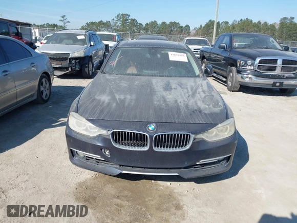 2014 BMW 3 Series 335i with VIN WBA3A9C54EF477943, listed as a IAAI auction lot 41632554 with 102,273 mi miles. Bid and sale history available at carsss.com. Image 12.