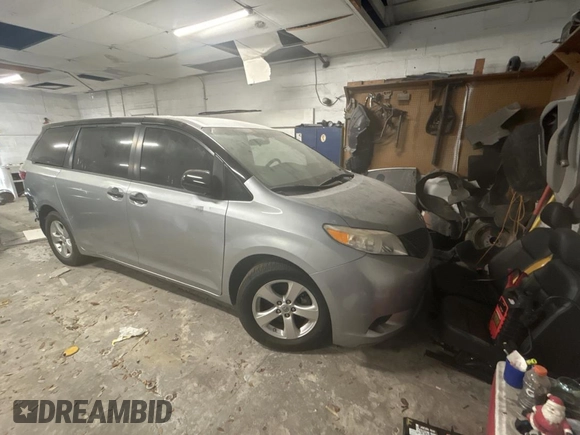 2015 Toyota Sienna L with VIN 5TDZK3DC5FS623224, listed as a Copart auction lot 54958485 with 82,419 mi miles and Salvage Title. Bid and sale history available at carsss.com. Image 1.