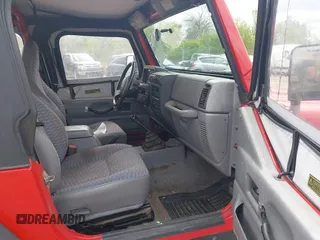 1998 Jeep Wrangler SE with VIN 1J4FY29P2WP766420, listed as a IAAI auction lot 42318624 with 200,129 mi miles and . Bid and sale history available at DreamBid. Image 5.