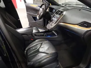 2015 Lincoln MKC with VIN 5LMTJ2AH0FUJ28744, listed as a IAAI auction lot 41888775 with 145,872 mi miles. Bid and sale history available at carsss.com. Image 5.