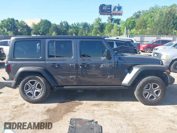 2021 Jeep Wrangler Unlimited Sport S with VIN 1C4HJXDG3MW801301, listed as a IAAI auction lot 42319387 with Not provided miles and . Bid and sale history available at DreamBid. Image 13.