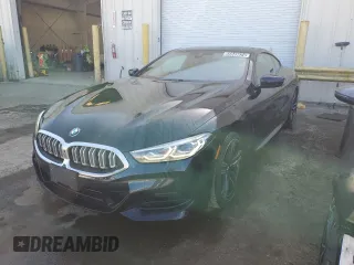 2023 BMW 8 Series 840i with VIN WBAAE2C04PCL62366, listed as a Copart auction lot 55849624 with 21,565 mi miles. Bid and sale history available at carsss.com. Image 1.
