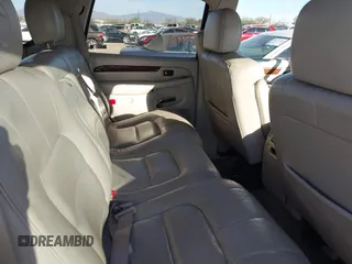 2002 Cadillac Escalade z VIN 1GYEK63N22R101463, wystawiony jako IAAI lot #41621840 z przebiegiem 156 639 mil mil oraz . Historia ofert i sprzedaży dostępna na DreamBid. Obrazek 8.