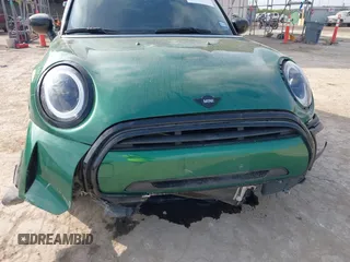 2022 MINI Hardtop 4 Door Cooper z VIN WMW33DK04N2P84250, wystawiony jako IAAI lot #42059692 z przebiegiem 34 238 mil mil oraz . Historia ofert i sprzedaży dostępna na DreamBid. Obrazek 6.