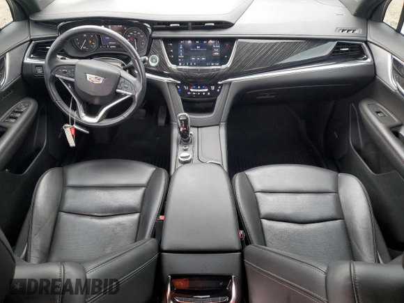 2021 Cadillac XT6 Premium Luxury with VIN 1GYKPCRSXMZ169206, listed as a Copart auction lot 55953525 with 64,789 mi miles and Salvage Title. Bid and sale history available at DreamBid. Image 8.