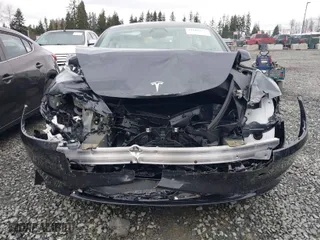 2025 Tesla Model 3 Long Range with VIN 5YJ3E1EB2SF921588, listed as a IAAI auction lot 41609999 with 113 mi miles. Bid and sale history available at carsss.com. Image 6.