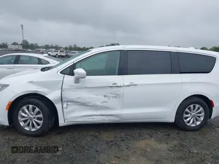 2018 Chrysler Pacifica Touring Plus z VIN 2C4RC1FG3JR102912, wystawiony jako IAAI lot #42240609 z przebiegiem 72 329 mil mil oraz . Historia ofert i sprzedaży dostępna na DreamBid. Obrazek 14.