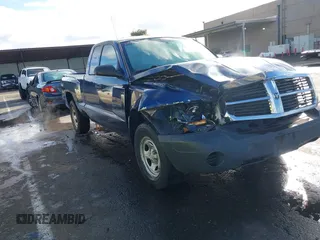 2005 Dodge Dakota ST with VIN 1D7HW22K75S294445, listed as a IAAI auction lot 41527655 with 112,155 mi miles. Bid and sale history available at carsss.com. Image 1.
