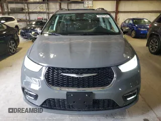2023 Chrysler Pacifica Limited with VIN 2C4RC1GG0PR529598, listed as a Copart auction lot 55287345 with 65,714 mi miles and Salvage title. Bid and sale history available at DreamBid. Image 5.