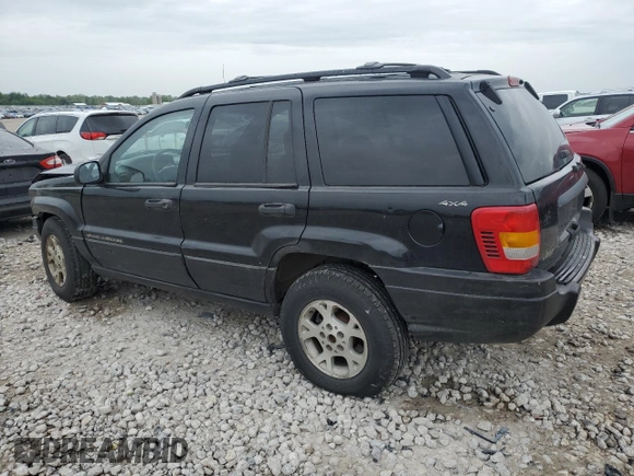 2000 Jeep Grand Cherokee Laredo z VIN 1J4GW48S1YC326453, wystawiony jako Copart lot #57332675 z przebiegiem 290 059 mil mil oraz Czysty tytuł • Clean title. Historia ofert i sprzedaży dostępna na DreamBid. Obrazek 2.