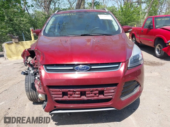 2015 Ford Escape Titanium with VIN 1FMCU0J92FUA38616, listed as a IAAI auction lot 42136816 with 131,941 mi miles and . Bid and sale history available at DreamBid. Image 12.