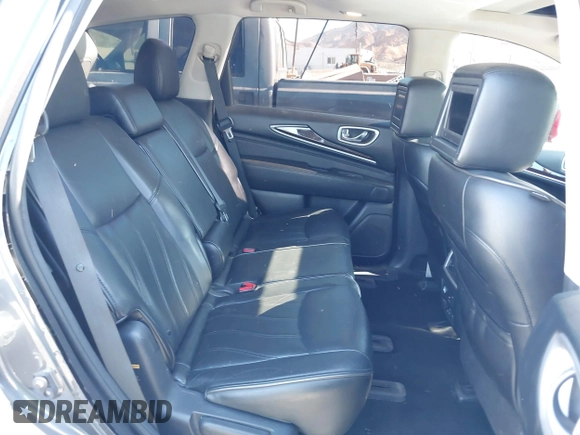 2013 Infiniti JX35 with VIN 5N1AL0MM8DC317601, listed as a IAAI auction lot 40678694 with 142,221 mi miles and . Bid and sale history available at DreamBid. Image 8.