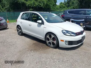 2011 Volkswagen Golf GTI w/Sunroof & Navi PZEV with VIN WVWHD7AJ0BW163867, listed as a IAAI auction lot 42793463 with 152,502 mi miles and . Bid and sale history available at DreamBid. Image 1.