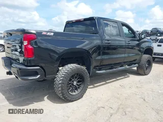2021 Chevrolet Silverado 1500 Custom with VIN 3GCUYBEFXMG200422, listed as a IAAI auction lot 41955342 with 40,876 mi miles and . Bid and sale history available at DreamBid. Image 4.