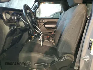 2020 Jeep Wrangler Unlimited Black and Tan with VIN 1C4HJXDG9LW331418, listed as a Copart auction lot 56414765 with 125,339 mi miles and Salvage title. Bid and sale history available at DreamBid. Image 7.