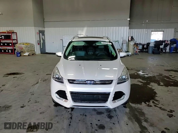 2016 Ford Escape Titanium with VIN 1FMCU9J99GUB20719, listed as a Copart auction lot 46063015 with 85,887 mi miles and Salvage Title. Bid and sale history available at carsss.com. Image 11.