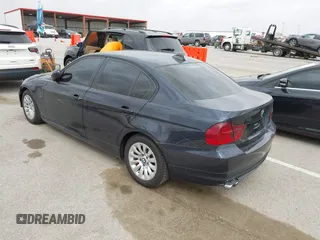 2009 BMW 3 Series 328i with VIN WBAPH77549NM30399, listed as a IAAI auction lot 41837955 with 82,610 mi miles. Bid and sale history available at carsss.com. Image 3.