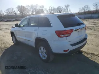 2013 Jeep Grand Cherokee Laredo with VIN 1C4RJEAG0DC636922, listed as a Copart auction lot 48796115 with 151,295 mi miles and Salvage Title. Bid and sale history available at carsss.com. Image 2.