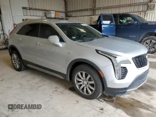 2019 Cadillac XT4 FWD Premium Luxury with VIN 1GYFZCR46KF198424, listed as a Copart auction lot 55465185 with 84,706 mi miles and Salvage title. Bid and sale history available at DreamBid. Image 4.