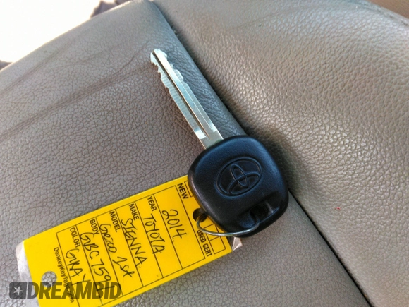 2014 Toyota Sienna XLE with VIN 5TDYK3DC2ES418860, listed as a IAAI auction lot 40139260 with 67,599 mi miles and . Bid and sale history available at DreamBid. Image 11.