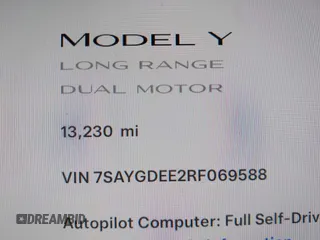 2024 Tesla Model Y Long Range z VIN 7SAYGDEE2RF069588, wystawiony jako IAAI lot #42024180 z przebiegiem 13 230 mil mil oraz . Historia ofert i sprzedaży dostępna na DreamBid. Obrazek 15.