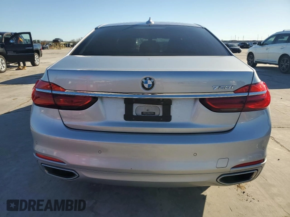 2018 BMW 7 Series 750i with VIN WBA7F0C57JGM23653, listed as a Copart auction lot 43462555 with 62,853 mi miles and Salvage Title. Bid and sale history available at carsss.com. Image 6.