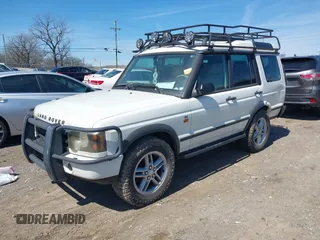 2004 Land Rover Discovery SE z VIN SALTY19484A841591, wystawiony jako IAAI lot #41846869 z przebiegiem 137 886 mil mil oraz . Historia ofert i sprzedaży dostępna na DreamBid. Obrazek 2.