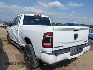 2023 Ram 2500 Laramie with VIN 3C6UR5FL3PG517960, listed as a IAAI auction lot 42128355 with 101,733 mi miles and . Bid and sale history available at DreamBid. Image 3.