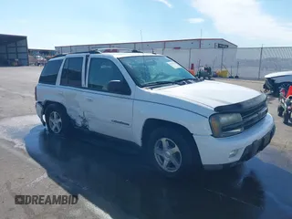 2004 Chevrolet TrailBlazer LS with VIN 1GNDT13S842389970, listed as a IAAI auction lot 40377507 with 178,488 mi miles and . Bid and sale history available at DreamBid. Image 1.