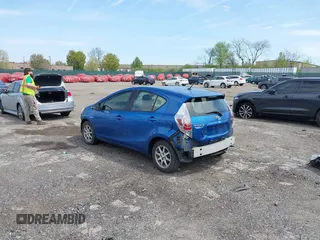 2014 Toyota Prius One with VIN JTDKDTB33E1565723, listed as a IAAI auction lot 42070826 with 145,811 mi miles and . Bid and sale history available at DreamBid. Image 3.