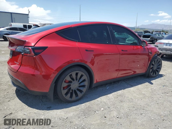 2022 Tesla Model Y Performance z VIN 7SAYGDEF9NF510183, wystawiony jako Copart lot #61263405 z przebiegiem 19 411 mil mil oraz Szkoda całkowita • Salvage title. Historia ofert i sprzedaży dostępna na DreamBid. Obrazek 3.