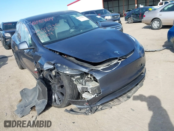 2022 Tesla Model Y Performance z VIN 7SAYGDEF8NF494753, wystawiony jako IAAI lot #41692464 z przebiegiem 14 616 mil mil oraz . Historia ofert i sprzedaży dostępna na DreamBid. Obrazek 6.