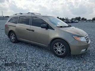 2012 Honda Odyssey LX with VIN 5FNRL5H25CB109643, listed as a Copart auction lot 55951805 with 128,341 mi miles and Clean Title. Bid and sale history available at carsss.com. Image 4.