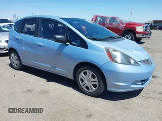 2009 Honda Fit z VIN JHMGE88259S037601, wystawiony jako IAAI lot #42428704 z przebiegiem 55 823 mil mil oraz . Historia ofert i sprzedaży dostępna na DreamBid. Obrazek 1.