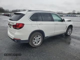 2014 BMW X5 xDrive35i with VIN 5UXKR0C50E0K42458, listed as a Copart auction lot 52069455 with 146,602 mi miles and Salvage Title. Bid and sale history available at carsss.com. Image 3.