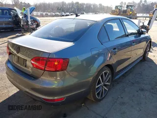 2012 Volkswagen Jetta GLI Autobahn with VIN 3VW5A7AJ5CM378588, listed as a IAAI auction lot 41318511 with 84,703 mi miles and . Bid and sale history available at DreamBid. Image 4.