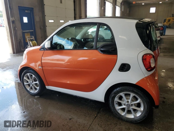 2018 Smart fortwo Pure with VIN WMEFJ9BA6JK270276, listed as a Copart auction lot 64037285 with 47,377 mi miles and Clean title. Bid and sale history available at DreamBid. Image 2.