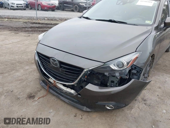 2014 Mazda 3 S Grand Touring with VIN JM1BM1W39E1145186, listed as a IAAI auction lot 41948404 with 111,702 mi miles and . Bid and sale history available at DreamBid. Image 6.