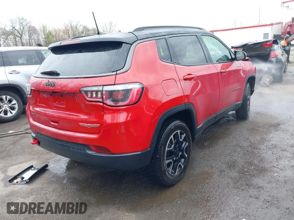2019 Jeep Compass Trailhawk with VIN 3C4NJDDB6KT786348, listed as a IAAI auction lot 41963536 with 58,598 mi miles and . Bid and sale history available at DreamBid. Image 4.