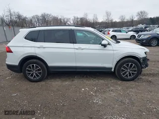 2020 Volkswagen Tiguan SE with VIN 3VV2B7AX0LM075033, listed as a IAAI auction lot 41310056 with 82,548 mi miles. Bid and sale history available at carsss.com. Image 13.