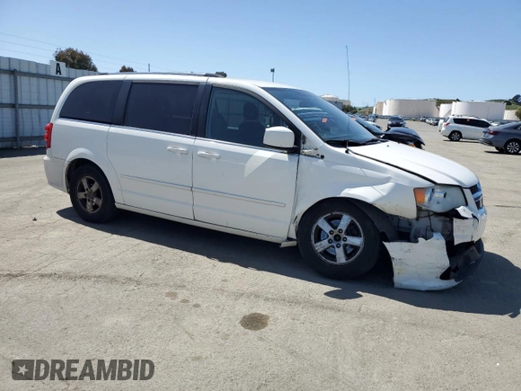 2011 Dodge Grand Caravan Crew with VIN 2D4RN5DG4BR699707, listed as a Copart auction lot 52055425 with 144,904 mi miles and Salvage Title. Bid and sale history available at DreamBid. Image 4.
