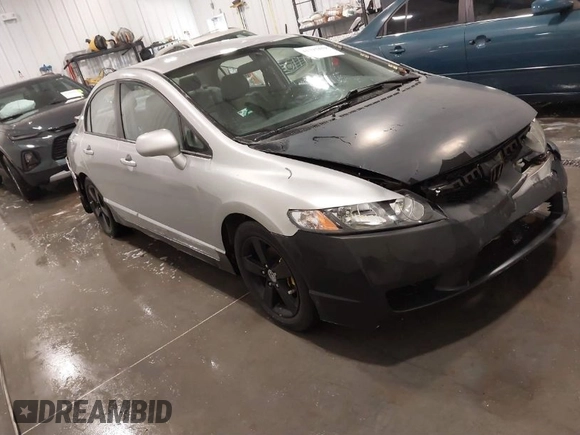 2009 Honda Civic LX z VIN 2HGFA16559H320179, wystawiony jako IAAI lot #41793459 z przebiegiem 172 878 mil mil oraz . Historia ofert i sprzedaży dostępna na DreamBid. Obrazek 1.