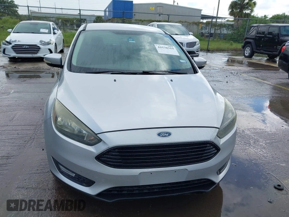 2016 Ford Focus SE с VIN 1FADP3FE7GL406809, выставлен на аукционе IAAI как лот 42570319 с пробегом 114 550 миль миль и . История ставок и продаж доступна на DreamBid. Изображение 6.