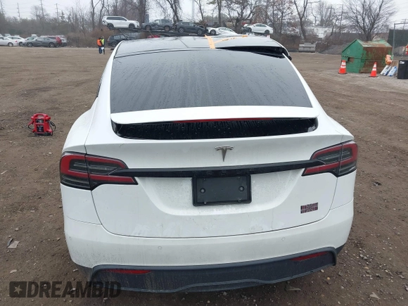 2022 Tesla Model X Plaid z VIN 7SAXCBE67NF339557, wystawiony jako IAAI lot #41825360 z przebiegiem 70 mil mil oraz . Historia ofert i sprzedaży dostępna na DreamBid. Obrazek 16.