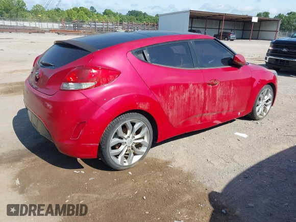2012 Hyundai Veloster w/Black Int with VIN KMHTC6AD3CU032989, listed as a IAAI auction lot 42633748 with 137,727 mi miles and . Bid and sale history available at DreamBid. Image 4.